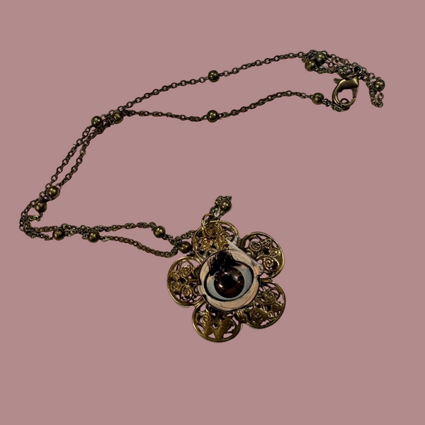 Blinking Eye Flower Necklace by OK Artist Amelie's Anomalies